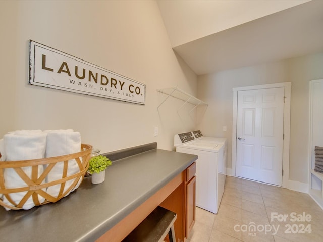 washroom featuring independent washer and dryer and light tile patterned floors