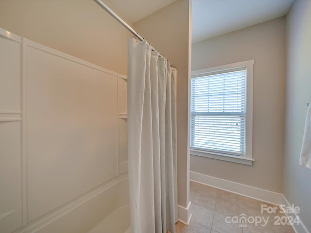 bathroom with tile patterned flooring