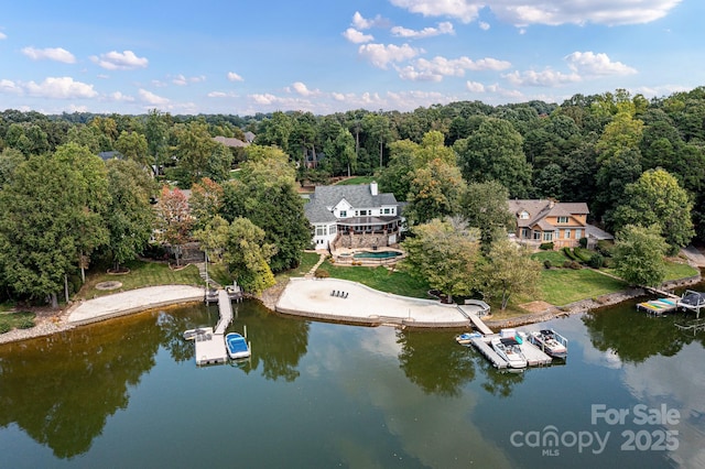 drone / aerial view featuring a water view