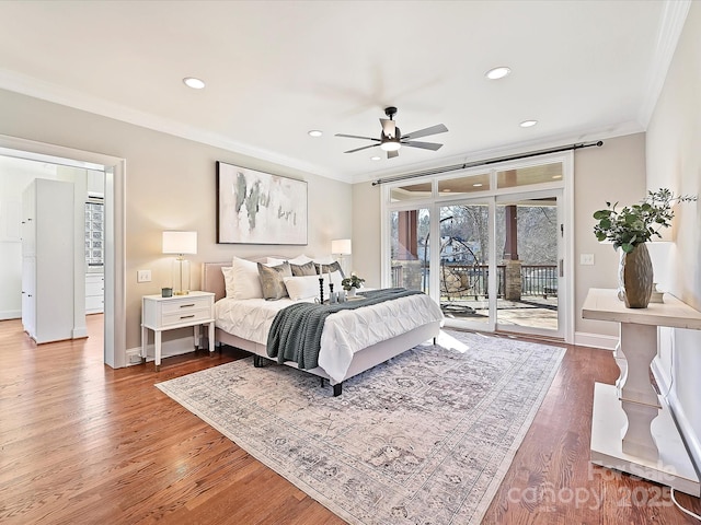 bedroom with access to exterior, hardwood / wood-style flooring, ceiling fan, and ornamental molding