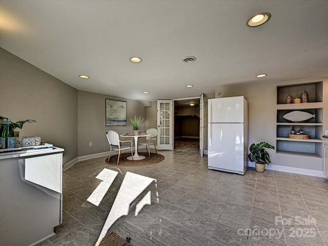 dining room with french doors and built in features