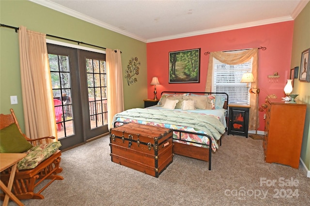 carpeted bedroom featuring access to exterior and ornamental molding