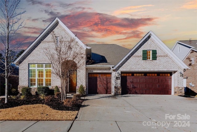 view of front of home with a garage