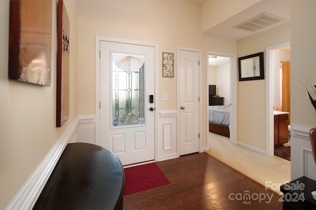 foyer featuring dark hardwood / wood-style flooring