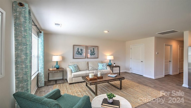 living room with hardwood / wood-style floors