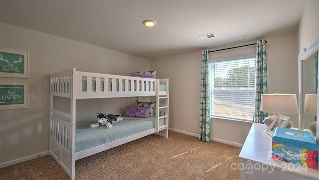 bedroom featuring carpet