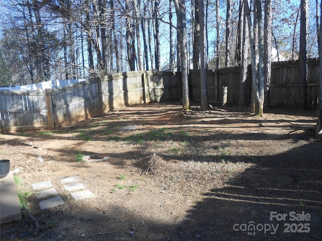 view of yard featuring a fenced backyard