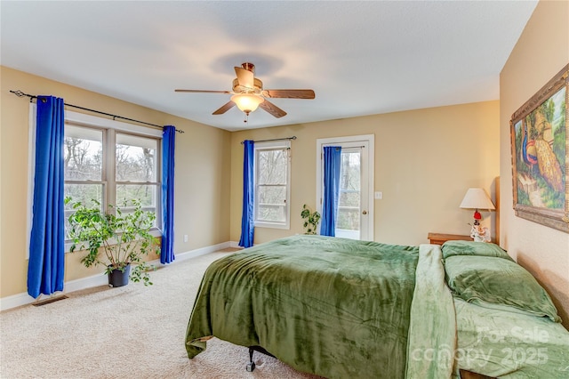 carpeted bedroom with access to outside and ceiling fan