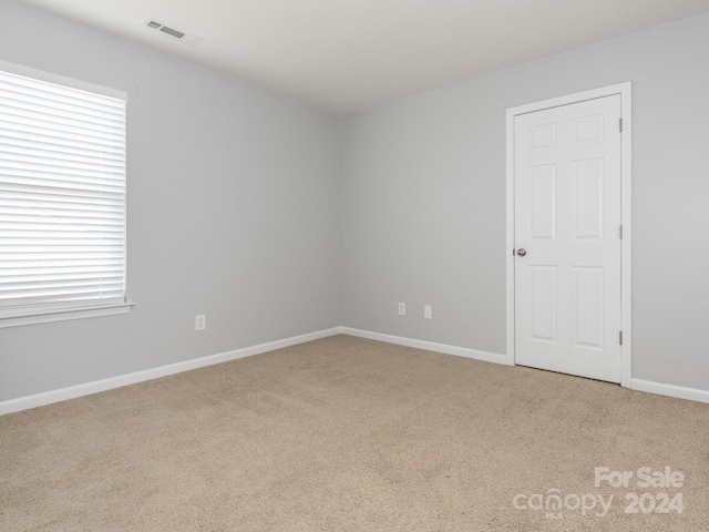 view of carpeted spare room