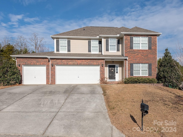 view of front property with a garage