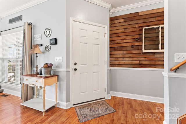 158 White Rd, Wadesboro, NC 28170 - foyer with visible vents, wood finished floors, baseboards, and ornamental molding