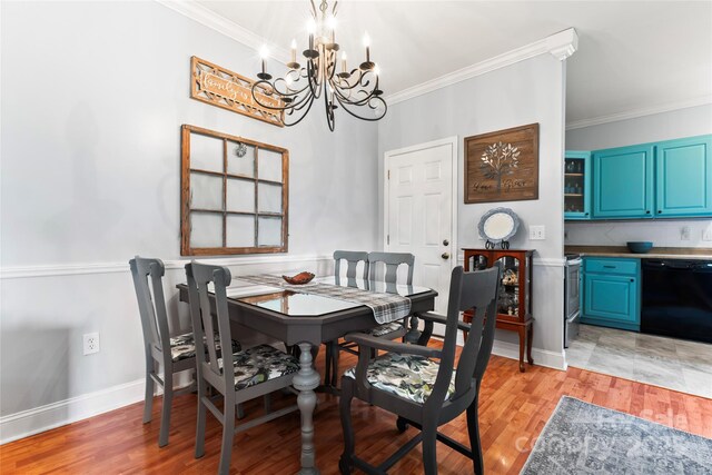 158 White Rd, Wadesboro, NC 28170 - dining space with light wood-style flooring, a notable chandelier, and ornamental molding