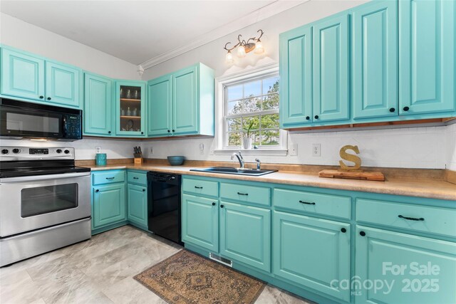 158 White Rd, Wadesboro, NC 28170 - kitchen with visible vents, blue cabinetry, a sink, black appliances, and crown molding