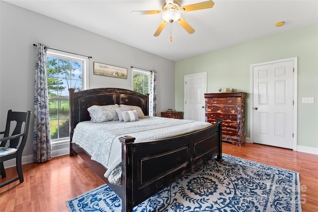 158 White Rd, Wadesboro, NC 28170 - bedroom with a ceiling fan, baseboards, and wood finished floors