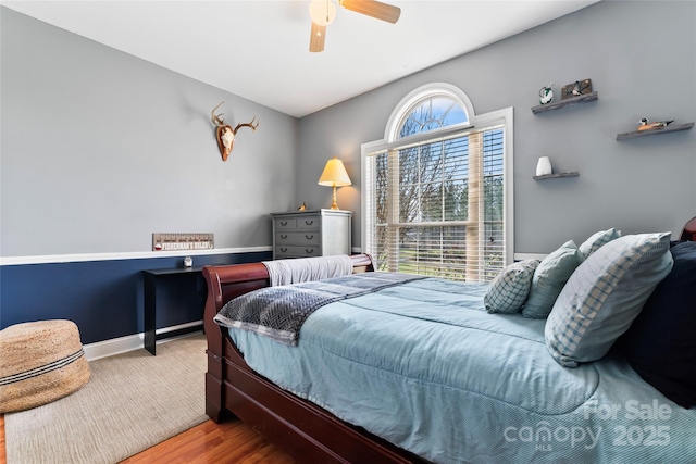 158 White Rd, Wadesboro, NC 28170 - bedroom featuring wood finished floors, baseboards, and ceiling fan
