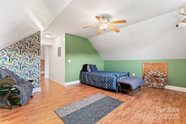 158 White Rd, Wadesboro, NC 28170 - bedroom featuring ceiling fan, baseboards, lofted ceiling, and wood finished floors