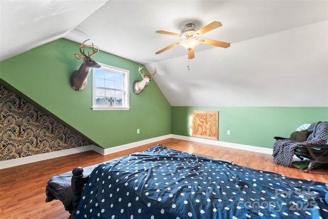 158 White Rd, Wadesboro, NC 28170 - bedroom featuring ceiling fan, baseboards, wood finished floors, and vaulted ceiling