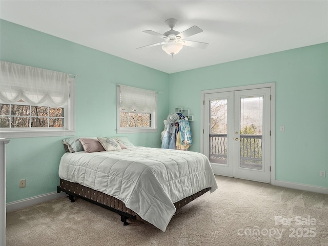 carpeted bedroom with ceiling fan, french doors, baseboards, and access to outside