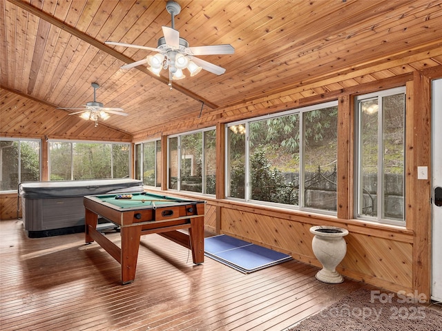 game room featuring wood-type flooring, wooden walls, wood ceiling, and vaulted ceiling