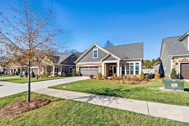 craftsman-style house with a front lawn