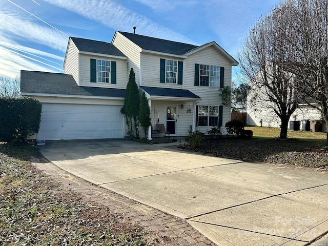 front of property featuring a garage