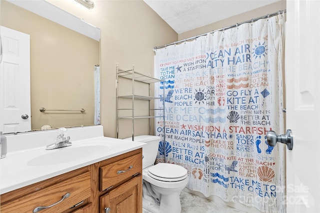 bathroom with curtained shower, vanity, a textured ceiling, and toilet