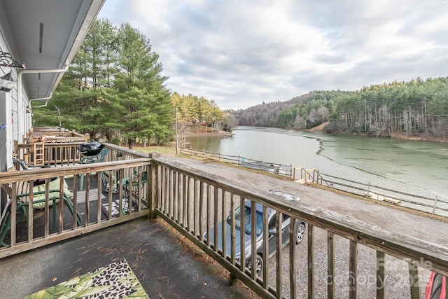 balcony featuring a water view