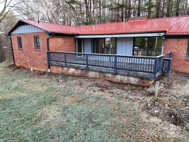 ranch-style house featuring a deck