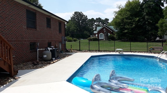 view of swimming pool with central AC