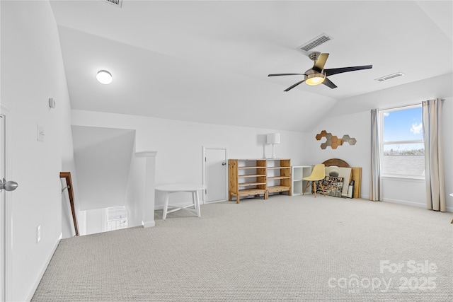 bonus room featuring ceiling fan, carpet floors, and vaulted ceiling