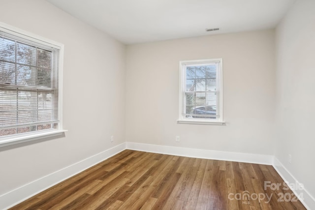 empty room featuring hardwood / wood-style floors