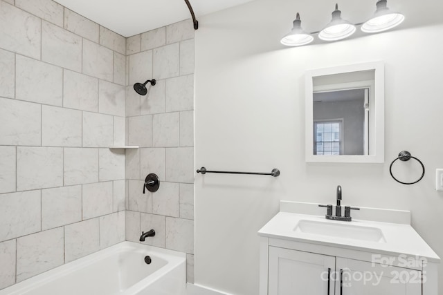 full bathroom with washtub / shower combination and vanity