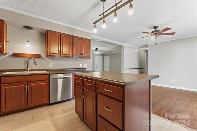 kitchen with a textured ceiling, stainless steel dishwasher, crown molding, and sink