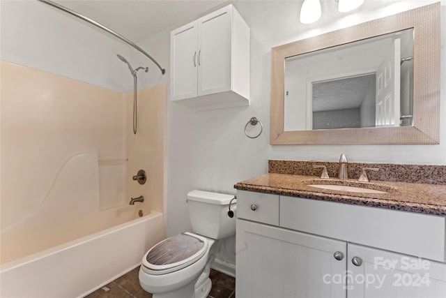 full bathroom with vanity,  shower combination, and toilet