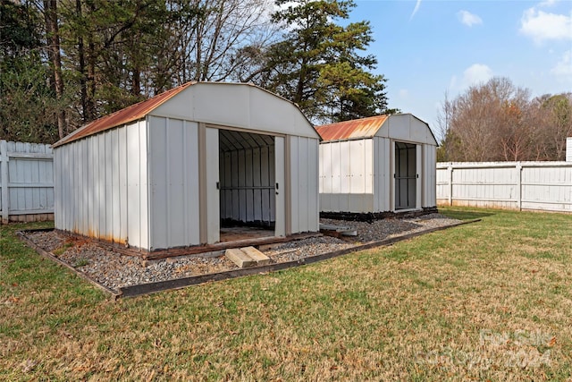 view of outdoor structure featuring a yard