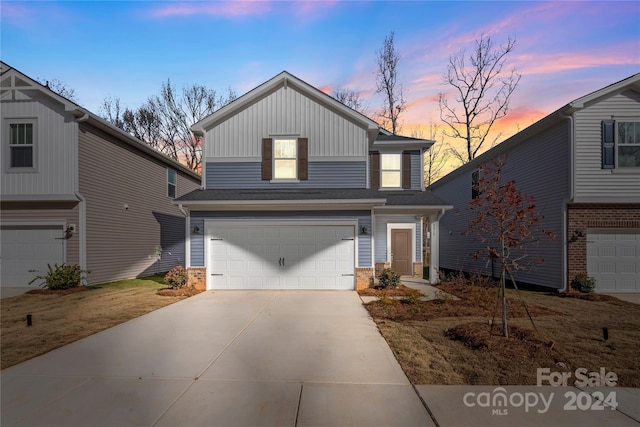 front facade with a garage