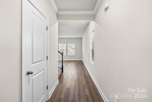 hallway with crown molding and dark hardwood / wood-style flooring