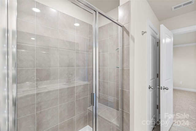 bathroom with an enclosed shower