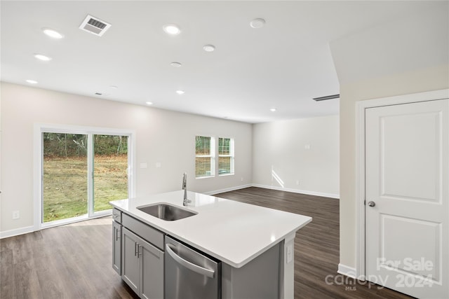 kitchen featuring dishwasher, gray cabinets, plenty of natural light, and sink