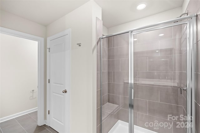 bathroom featuring tile patterned floors and walk in shower