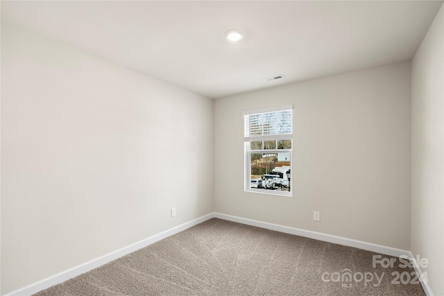 view of carpeted spare room