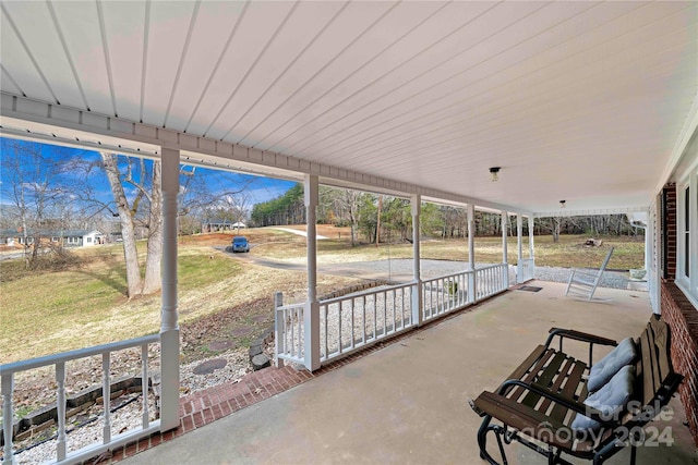 view of patio featuring a porch