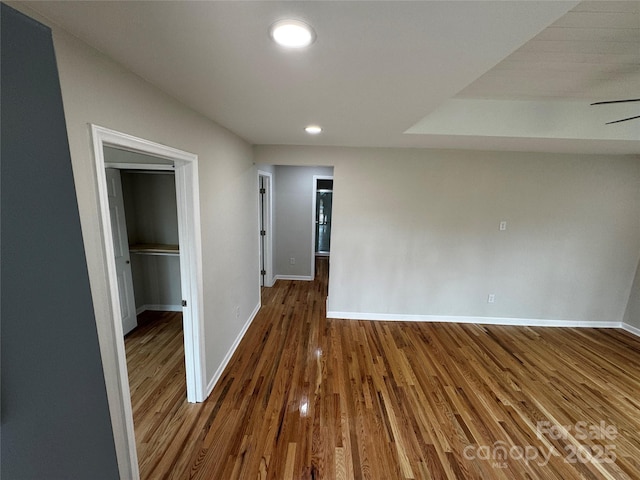 spare room with hardwood / wood-style floors