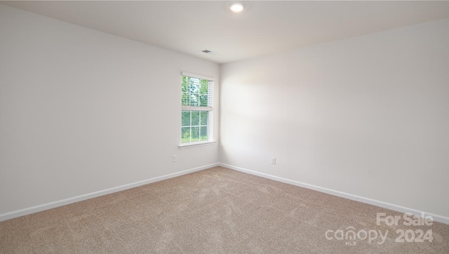 view of carpeted spare room