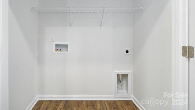 laundry area featuring hookup for an electric dryer, dark hardwood / wood-style floors, and hookup for a washing machine