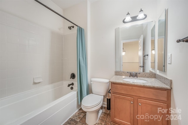 full bathroom featuring vanity, toilet, and shower / tub combo