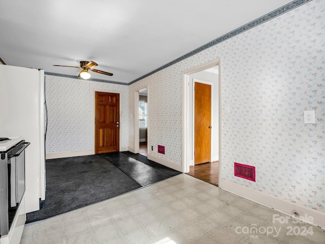 interior space featuring crown molding and ceiling fan