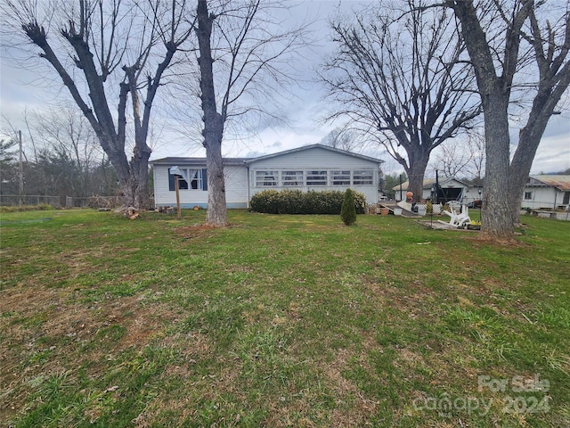 exterior space featuring a lawn