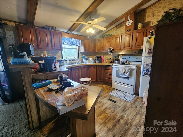 kitchen with hardwood / wood-style floors, white appliances, lofted ceiling with beams, ceiling fan, and ornamental molding