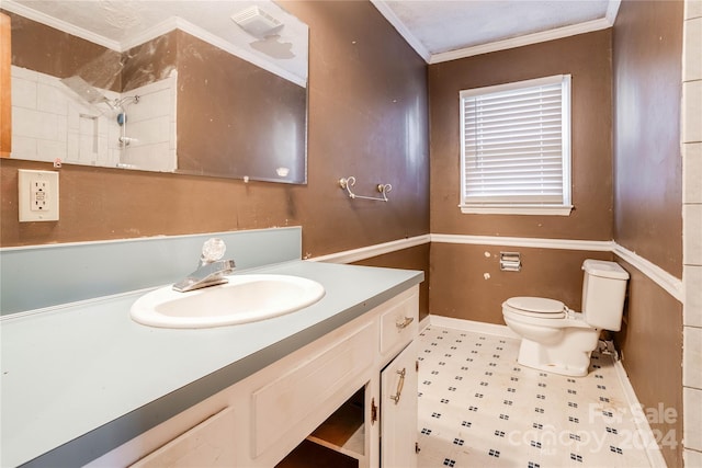 bathroom featuring vanity, toilet, walk in shower, and ornamental molding